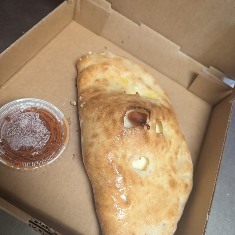 Indulge in Our Calzone