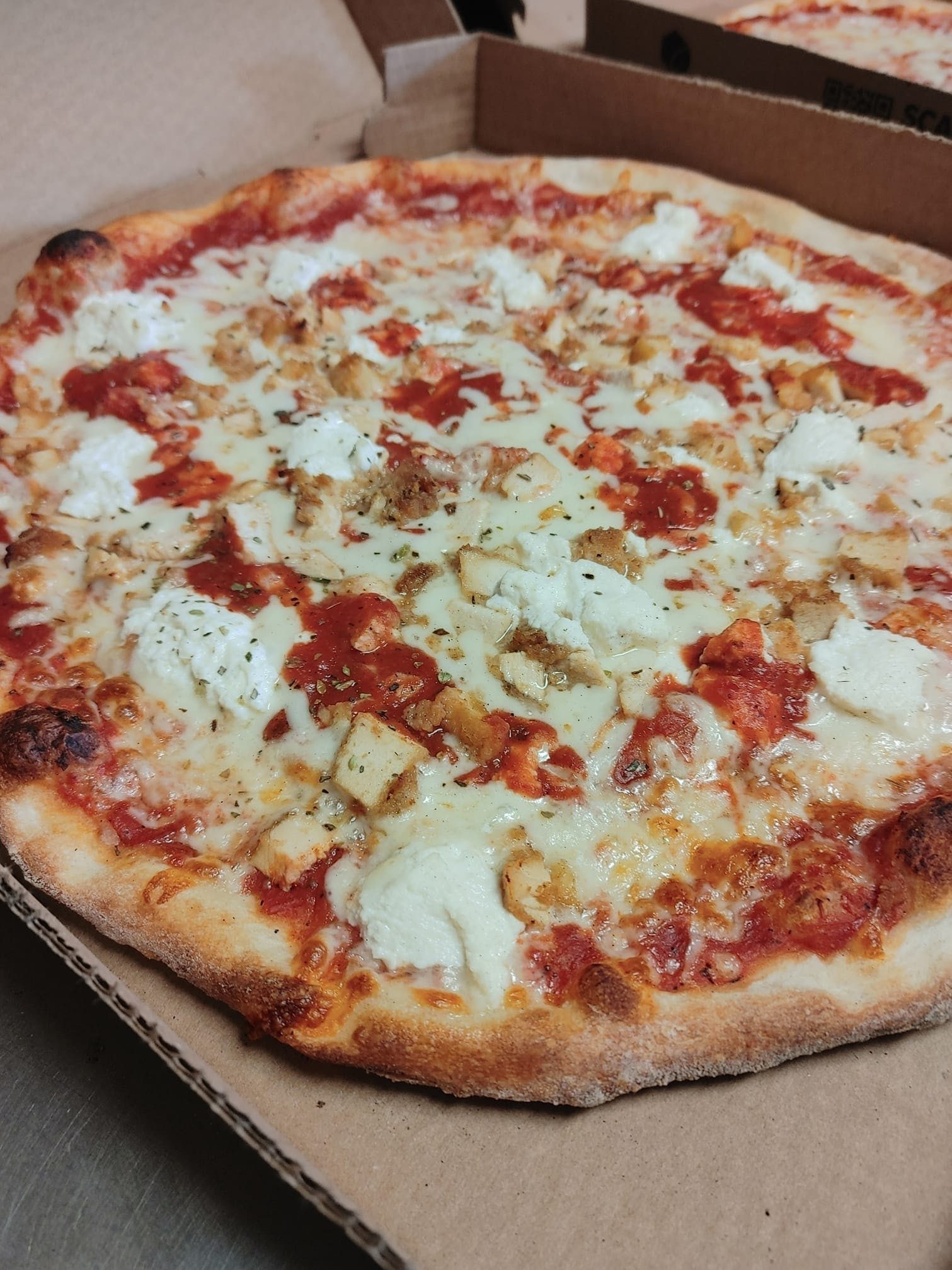 Chicken Parmigiana Pizza.