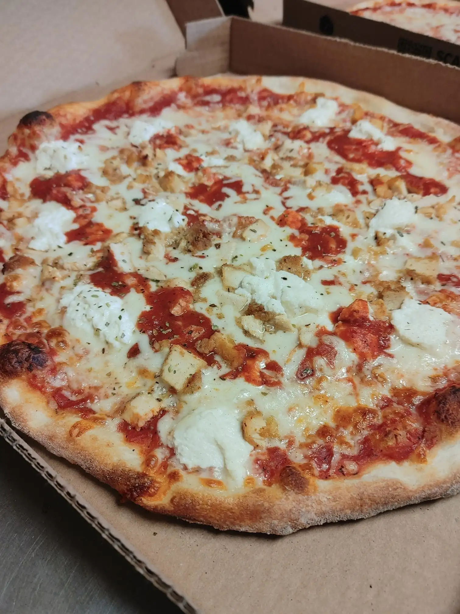 Chicken Parmigiana Pizza.