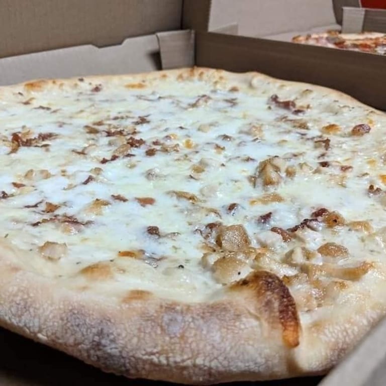 Indulge in Our Meat Pizza